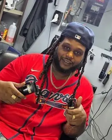 RJ, barber at Latch Life Wellington