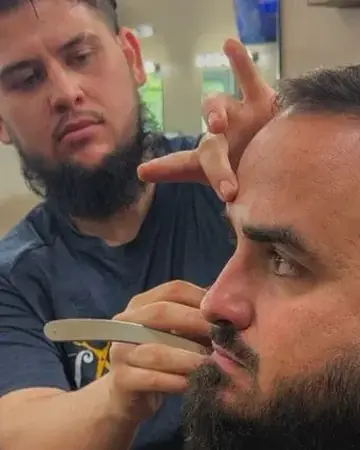 Eric, barber at Latch Life Wellington